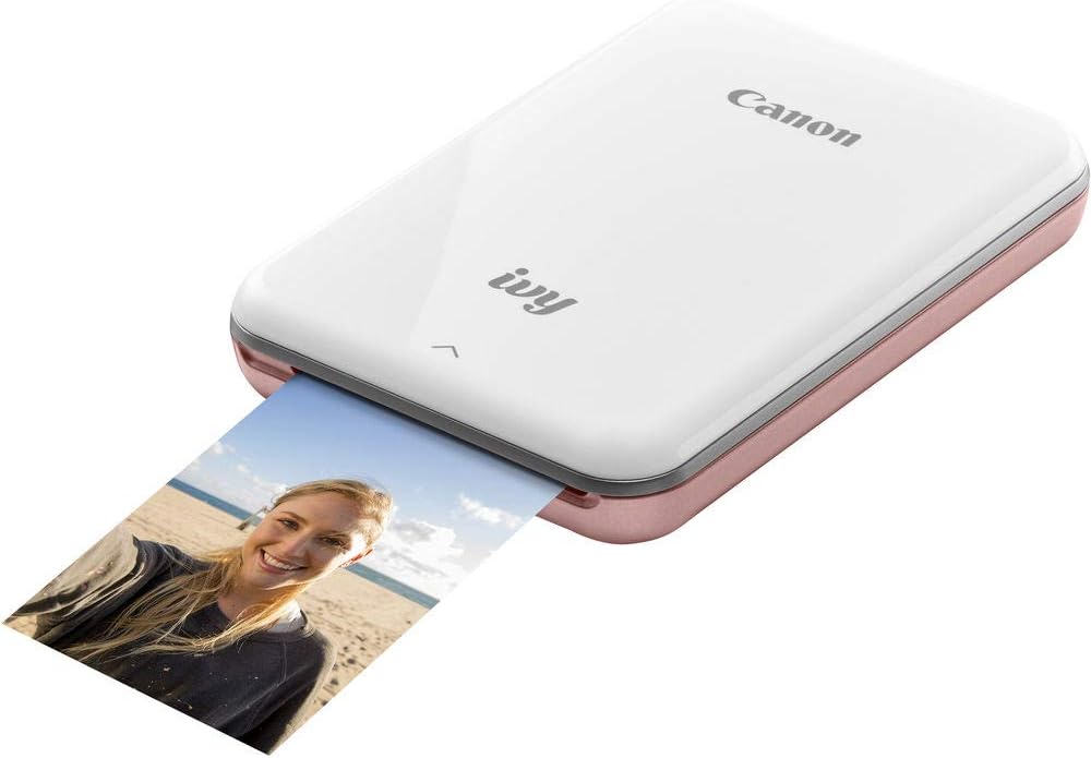 Canon IVY Mobile Instant Mini Photo Pocket Printer through Bluetooth, Portable, Rose Gold, Includes 2x3” Zink Photo Paper Sticker (100 Sheets), Protective case and USB Charging Cable with Wall Adapter